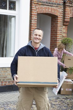 Man with van loading furniture for a local Coulsdon removal