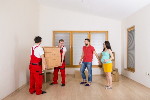Packed office equipment ready for transport during a Coulsdon relocation