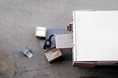 Packed moving boxes and furniture ready for transport