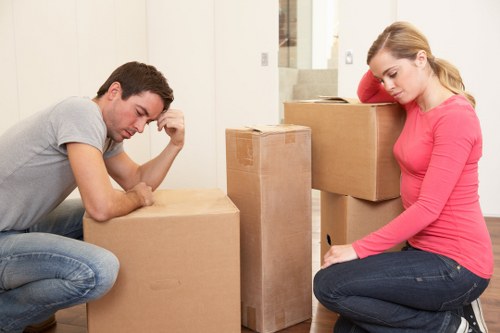 Professional movers loading office furniture in a local Coulsdon move