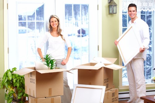 Furniture and boxes ready for collection by a Coulsdon man and van